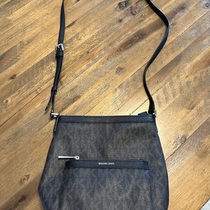 MK print Michael Kors crossbody bag, black.
